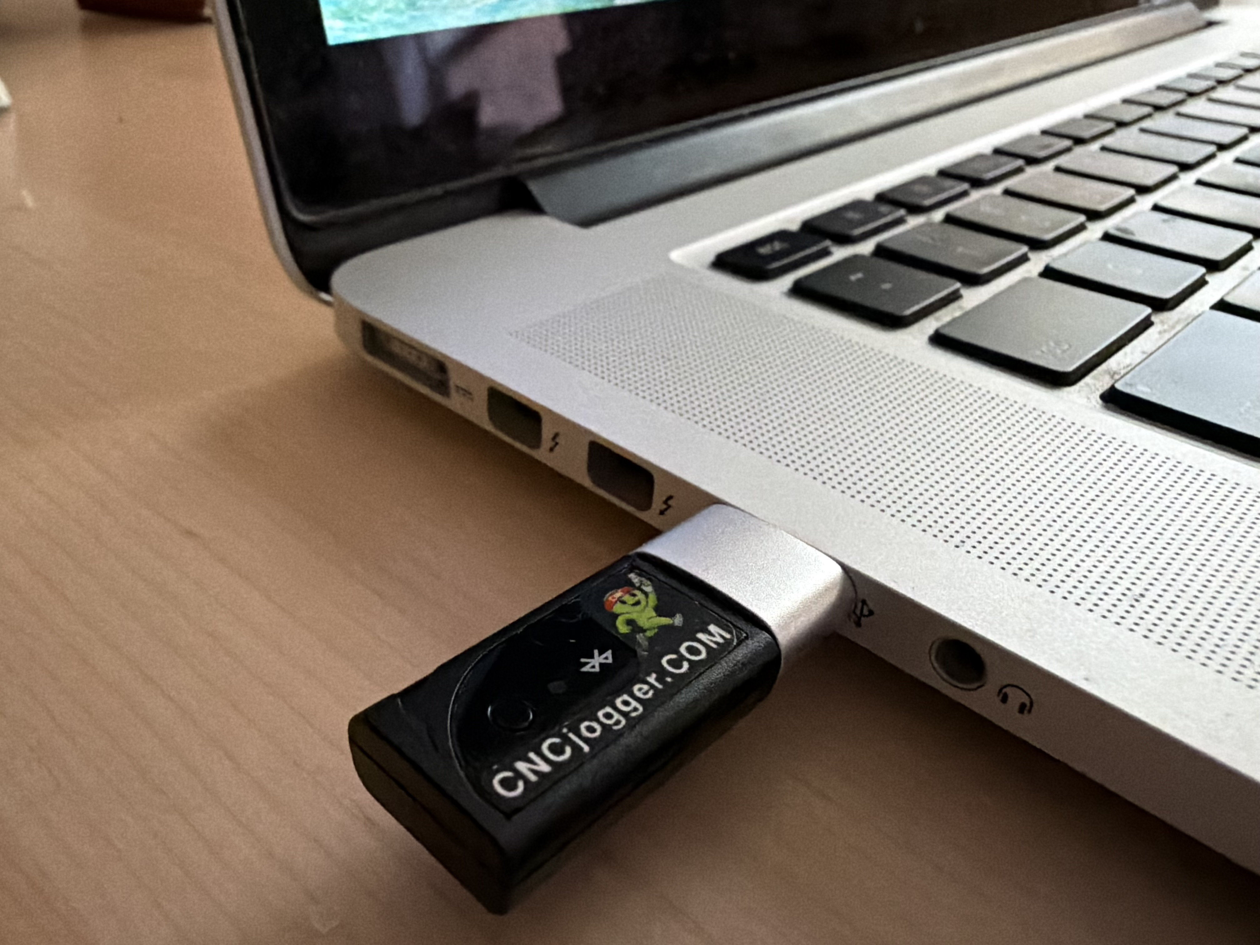 CNCjogger Stick with adapter in laptop USB-A port